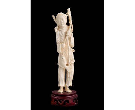 Ivory sculpture depicting "FISHERMAN" with eyes painted in ink. Original carved wooden base. China. Early 20th century. With 