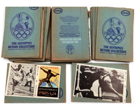 Approximately seventy Esso The Olympics Action Collection stamp packets. P&amp;P Group 1 (£14+VAT for the first lot and £1+VA