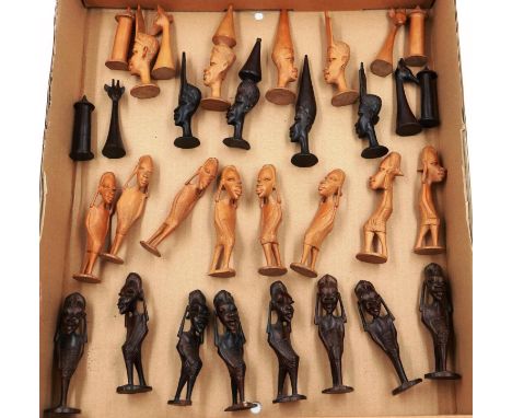 Carved African chess set, King H: 11 cm, complete with some losses to base. P&amp;P Group 2 (£18+VAT for the first lot and £3