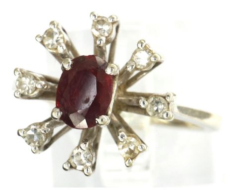 18ct white gold ruby and diamond cluster ring, size L, 3.36g. P&amp;P Group 1 (£14+VAT for the first lot and £1+VAT for subse