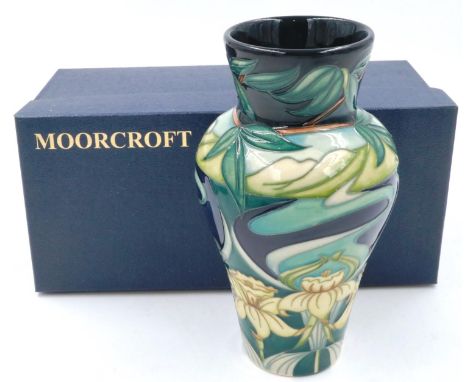 Boxed limited edition Moorcroft vase by Rachel Bishop, in the Daffodil and Hills pattern, 106/250, H: 21 cm, no cracks or chi