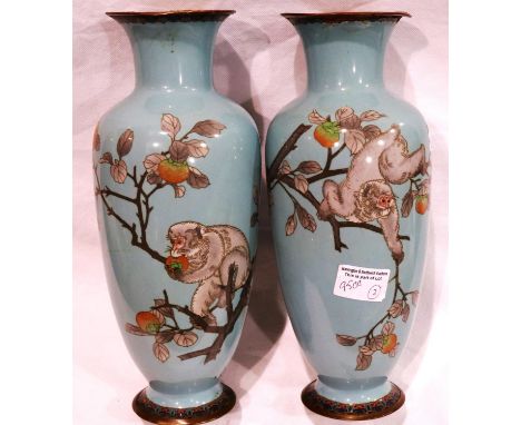 Pair of Chinese 19th century cloisonne vases, each with designs of monkeys within peach tress against a blue ground, each H: 