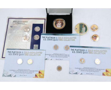 Mixed collectors edition coins, including Danbury Mint US State Quarters, 1973 JFK uncirculated half-dollars, and large QEII 