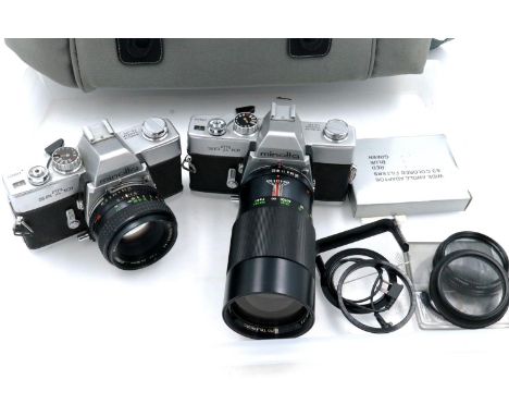 Two Minolta SRT cameras in travel bag, shutters working at lotting. P&amp;P Group 2 (£18+VAT for the first lot and £3+VAT for