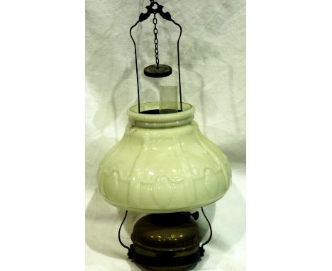 20th century ceiling lantern with brass paraffin reservoir and translucent white glass shade, H: 60 cm. Not available for in-