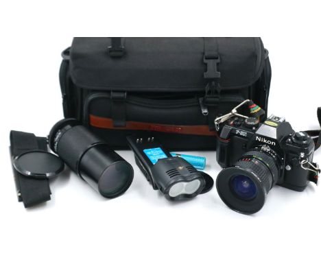 Nikon F301 18-28 and 70-210 lenses, in travel bag, shutter working at lotting. P&amp;P Group 2 (£18+VAT for the first lot and
