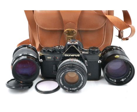 Olympus OM2N kit with lenses in travel bag, working at lotting. P&amp;P Group 2 (£18+VAT for the first lot and £3+VAT for sub