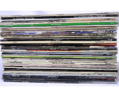 Approximately fifty mainly Rock LPs including Meatloaf. P&amp;P Group 3 (£25+VAT for the first lot and £5+VAT for subsequent 