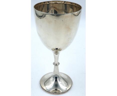 Hallmarked silver trophy, London assay, 219g, H: 21 cm, no engraving, slight dents to some parts of the silver, hallmarks are