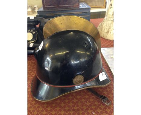 An early 20th Century Swiss fireman's helmet.