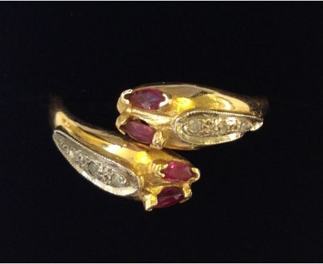 An 18 carat gold ruby and diamond set Snake ring.