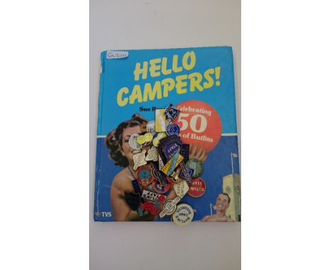 A carton containing various Butlins staff and other original 1960's enamel Butlins badges together with an annual: Hello Camp
