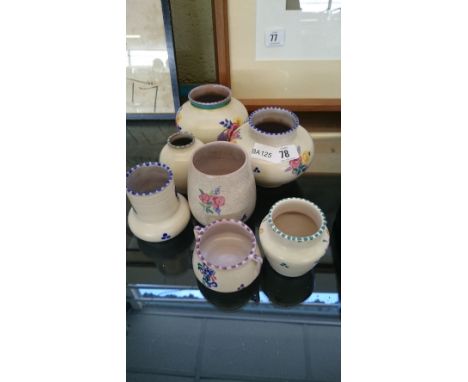 Seven various Poole Pottery items.