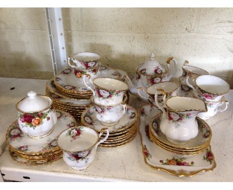 The residue of a Royal Albert bone china tea and dinner service decorated in the Celebration pattern.