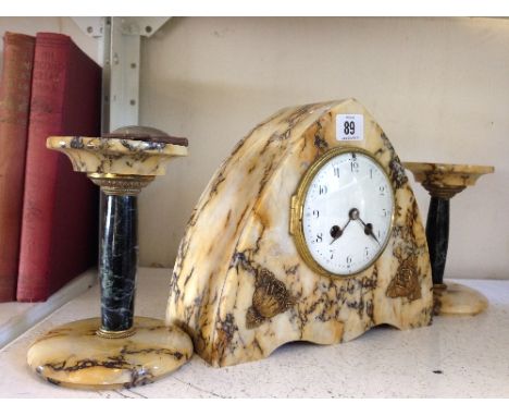 An early 20th century French marble cased clock garniture set with enamel dial.