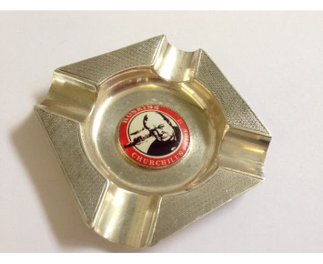 An engine turned silver ashtray, the centre decorated with an image of Winston Churchill, inscribed Hoskins Churchill's Pride