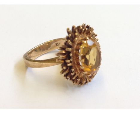 A 9 carat gold Brutalist style citrine set ladies' dress ring.