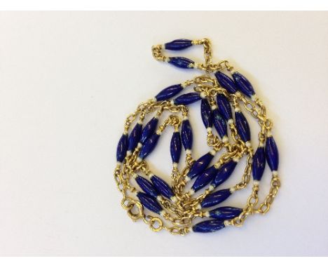 A gold blue and white enamel bead set necklace.

Condition Report: Enamel beads with faults.