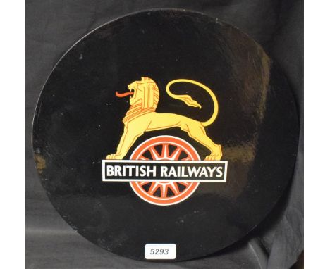 Railwayana - a 'coach panel' roundel applied with the first style British Railway ('Lion &amp; wheel') logo in gold, on a gre