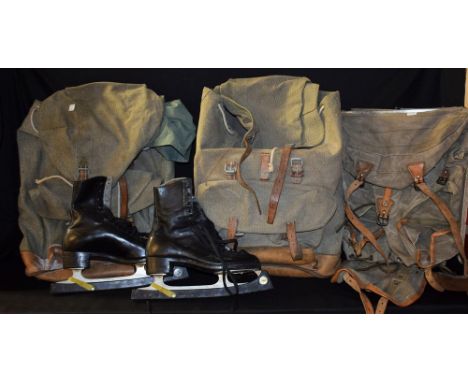 A Swiss Army rucksack; others; a pair of Stuburt ice skates (4)