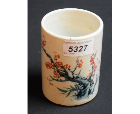 A Chinese ceramic brush pot, prunus decoration, six character mark to base
