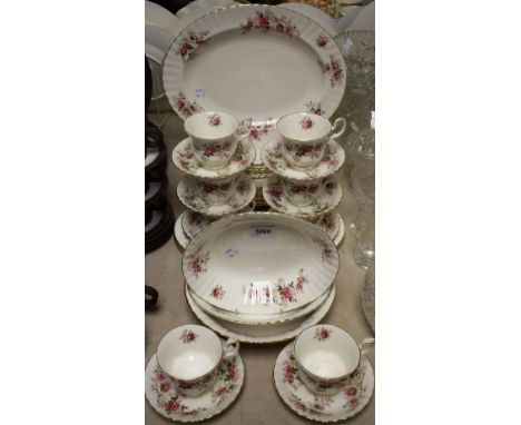 A Royal Albert Lavender Rose pattern part dinner and tea service, comprising teacups, saucers, tea plates, dinner plates, des
