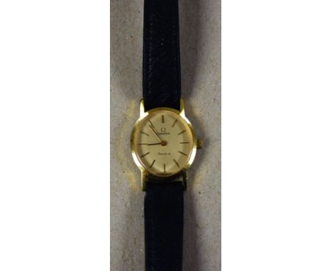 Omega - a ladies Geneve manual wristwatch, oval textured gilt dial, block baton markers, manual wind 625 cal movement, serial