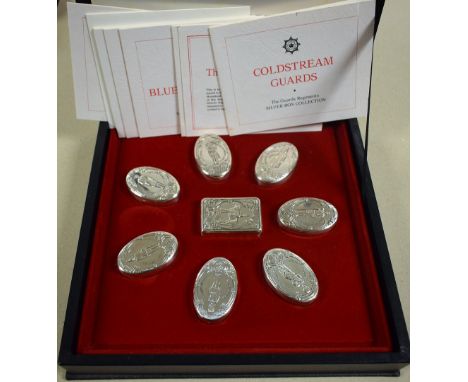 Silver - The Guards Regiments silver snuff box collection, Franklin Mint, comprising cased set of seven oval sterling silver 