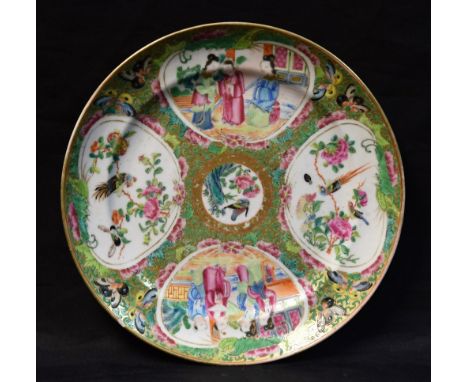 A Chinese Cantonese circular plate, decorated with four panels of birds, foliage and figures, on a foliate scroll ground, 19c