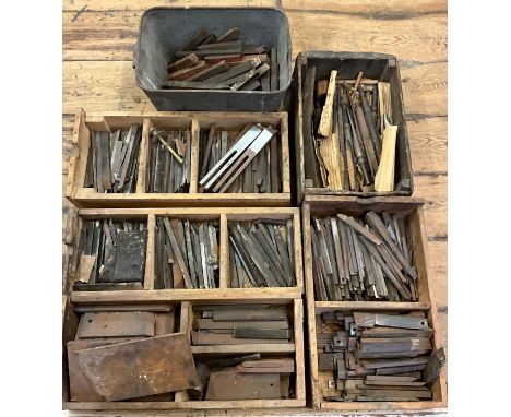 A large quantity of industrial wood lathe chisels / cutters, some for use in bobbin turning, the largest 30.5cm x 15cm.