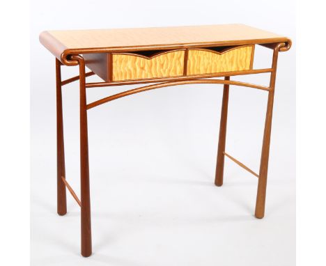 ANDREW VARAH (1944-2012), a craftsman made console table in quilted maple and walnut, circa 1990, with makers inset brass lab