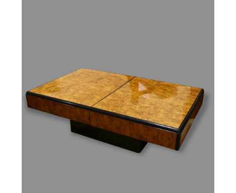 PAUL MICHEL - a 1970s Hollywood Regency style bar coffee table, with lacquered burr wood and ebonised detail, sliding top and