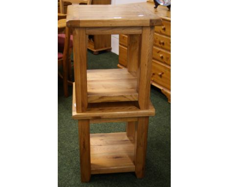 A pair of modern solid oak lamp/side tables