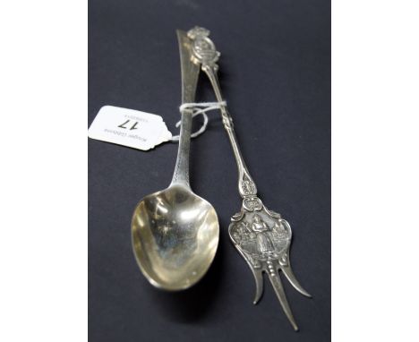 Georgian hallmarked silver tablespoon, London assay 1786, together with a relief-decorated three tang fork