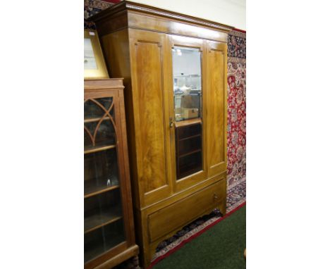 Light mahogany single mirrored door wardrobe with drawer below 