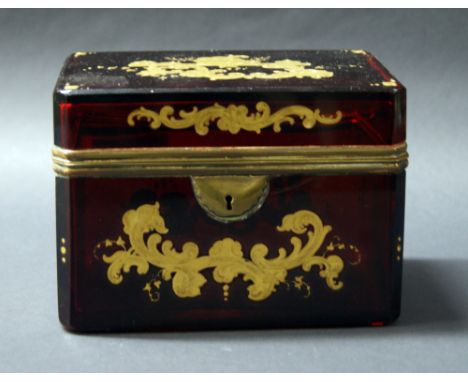 A ruby cut glass and gilt caddy with hinged colour  CONDITION REPORT; Small amount of gilt loss to the top and rear panel, hi