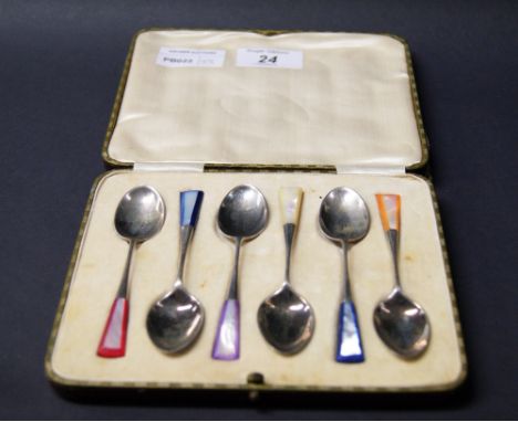 William Hutton & Sons, a set of six hallmarked silver teaspoons, each with a coloured mother of pearl grip. Boxed, Sheffield 