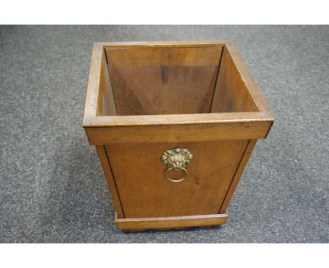 A pair of light mahogany square planters, each mounted with two lacquered brass lion mask handles
