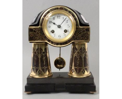 AN ART NOUVEAU MANTEL CLOCK Erhard & Söhne, Schw. Gmünd, ca. 1910 Lacquered wood with polished brass inlay, pendulum with str