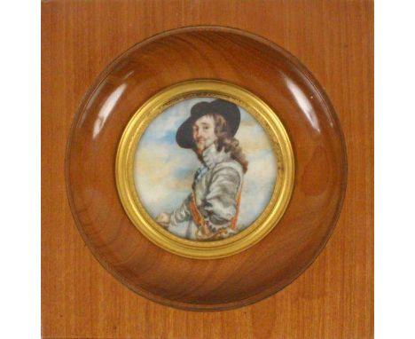 A MINIATURE A portrait of a noble French man of the 17th century, colourful painted on ivory, monogrammed: M.P.L.; diameter 6