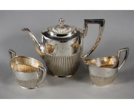 A TEA SERVICE Sweden, 1920 Silver, a 3-piece service in the Regency style monogrammed with: PSO; consisting of teapot, milk j