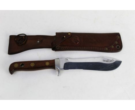 Puma White Hunter knife with 6" blade and hardwood scale handles, the blade marked White Hunter 6377, Serial No. 62273 stampe