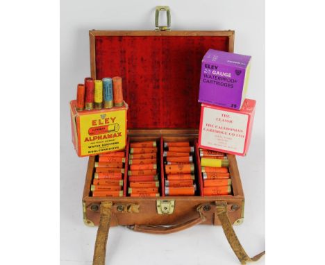 A leatherette cartridge magazine, together with various full and part boxes of shotgun cartridges, mostly 12 bore, to include