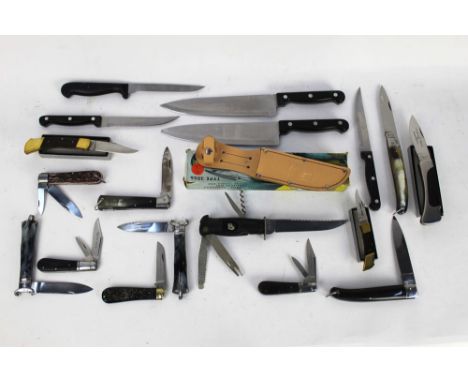 Nineteen folding and fixed blade knives, Whitby, Lockwood Brothers Sheffield and two knives with 12 bore cartridge extractors