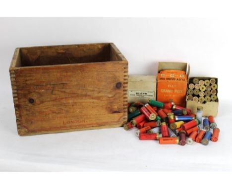 A vintage Eley wooden shotgun ammunition crate, containing various collectors cartridges, paper and plastic cases to include 