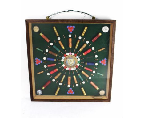 A vintage Eley cartridge display board containing various shotgun cartridges, 22 Rimfire cartridges etc, to include end caps 