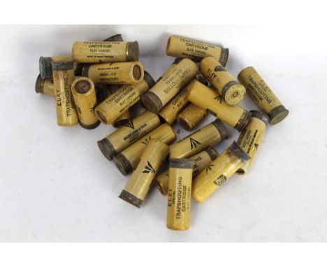 Twenty five mixed paper cased collectors cartridges, Eley Trap shooting stamped with a military broad arrow. SHOTGUN CERTIFIC