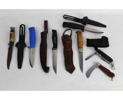 Seven fixed blade and folding knives, to include Normark, Frosts etc.  This bladed product is not for sale to people under th