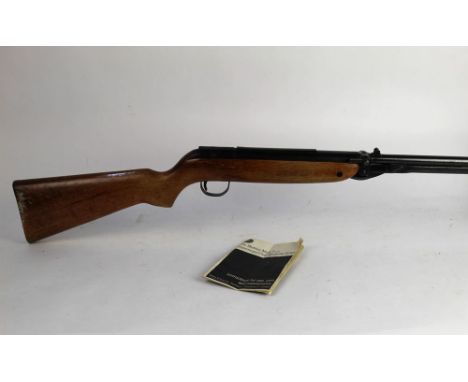 A Webley Mk III cal 22 underlever air rifle, a late model with spot welded telescopic sight ramp, the stock with plastic Webl