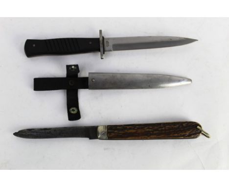 A Victorian folding knife, blade length 5 3/4", together with a German military style knife, blade stamped Gottlieb Hammesfah